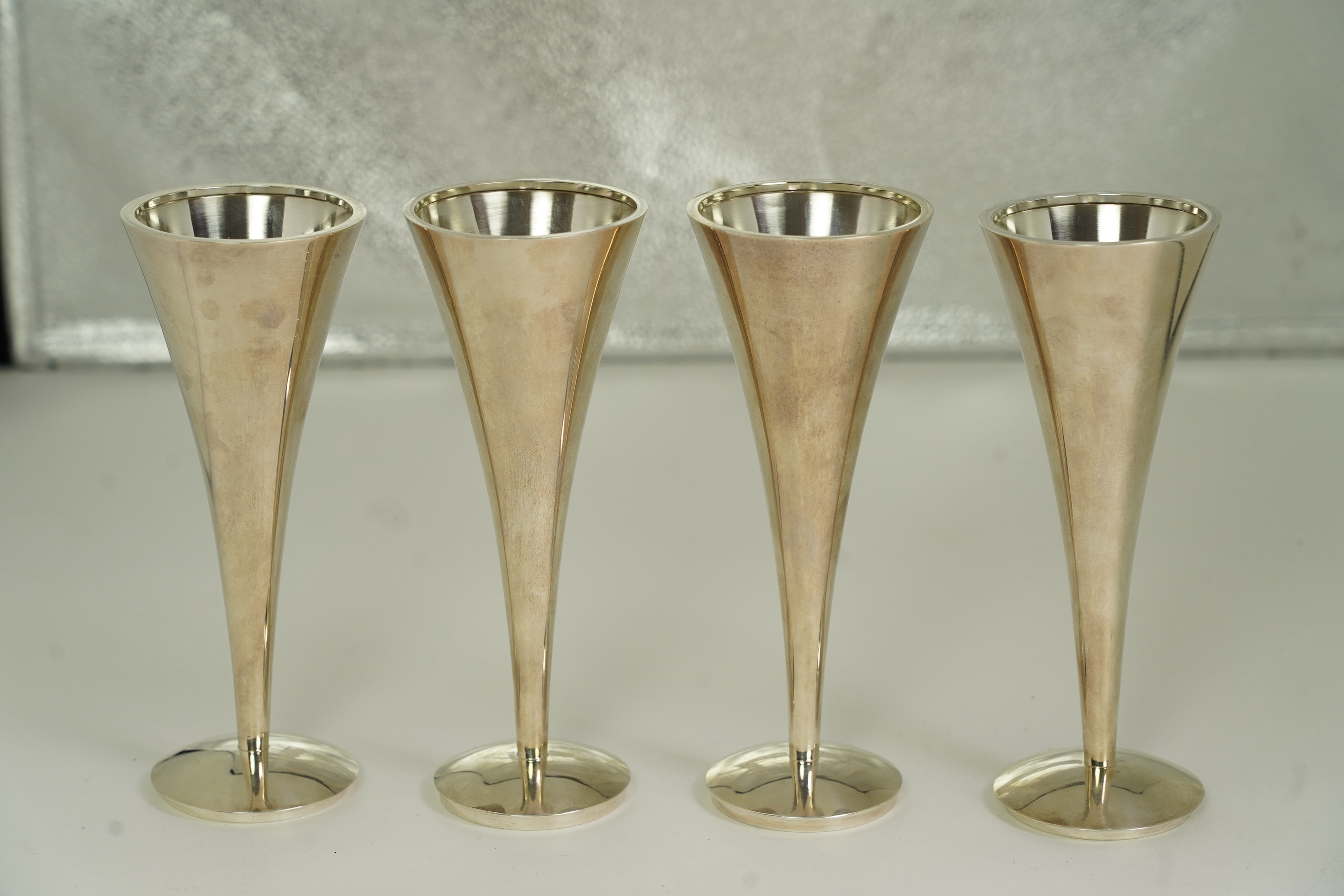 Two pairs of Elizabeth II Stuart Devlin silver candlestick bases